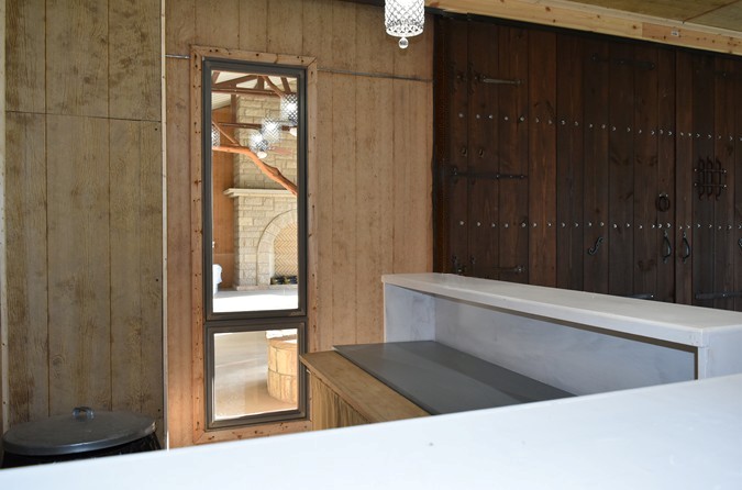 "View Into Serving Station With Window Access Into Pavilion"
