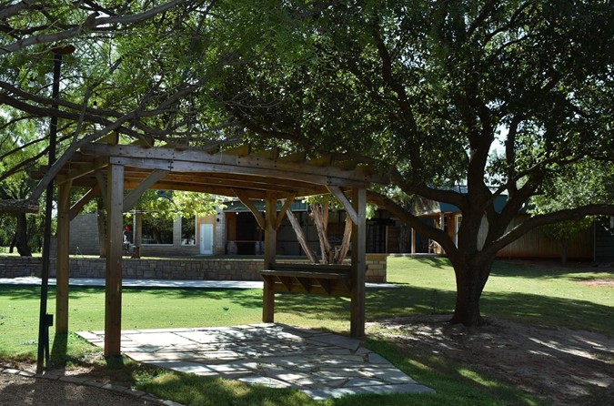 "View Of Building & Pavilion From Pergola"