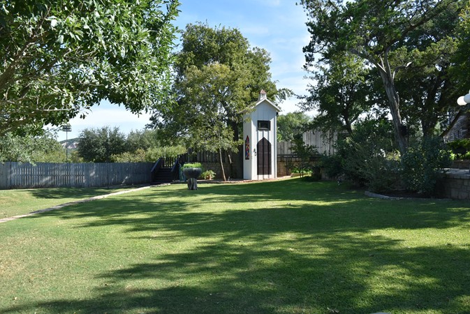 "Distance View Of Garden & Chapel
