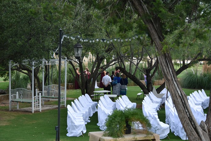 "Bridal Party Moves To Front Of Pampas Grass"