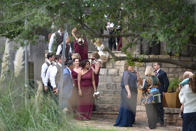 "Wedding Party Entering Down Rock Steps"