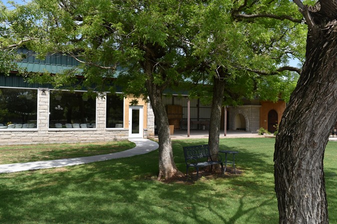 "Trees Provide Shade For Both Building & Pavilion"
