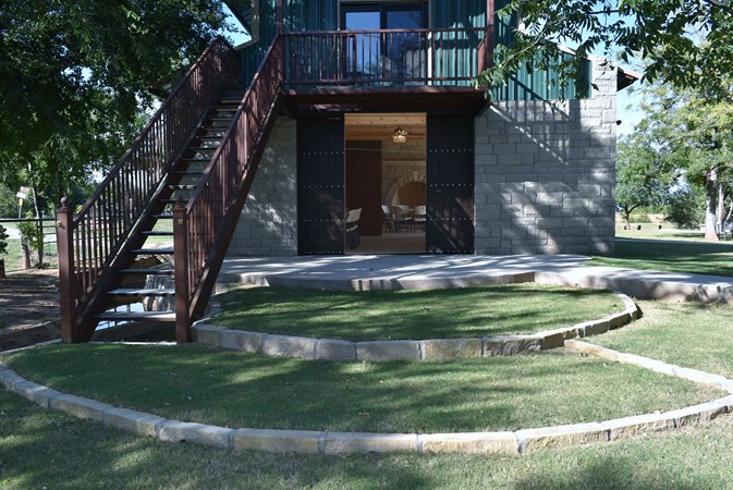 "Patio Like Steps Leading Into Building"