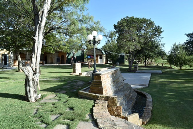"Stroll Past Waterfalls To Kiddie Korral"