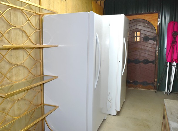 "Refigerator & Freezer And Door Opening Into Pavilion"