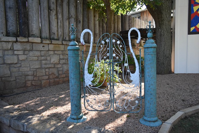 "Close Up of Unique Swan Gate"