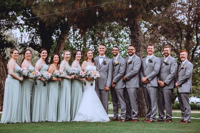 "Group Photo Taken On Front Lawn Of The Parks Place"