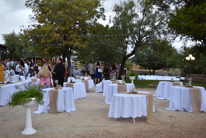 "Round Tables Reserved For Wedding Party"