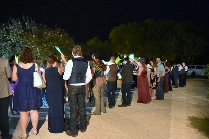 "Glow Stick Line Up For Send Off"