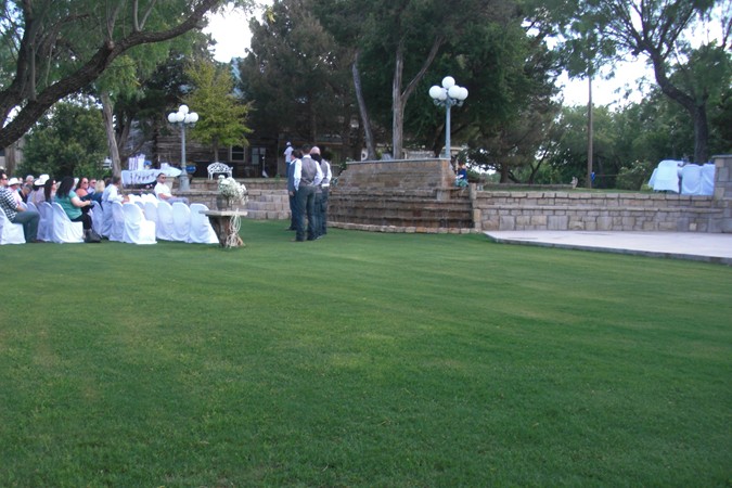 "Groom & Groomsmen Wait by the Waterfall"