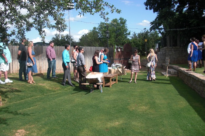 "Guests Sign Rustic Bench for Bride & Groom"
