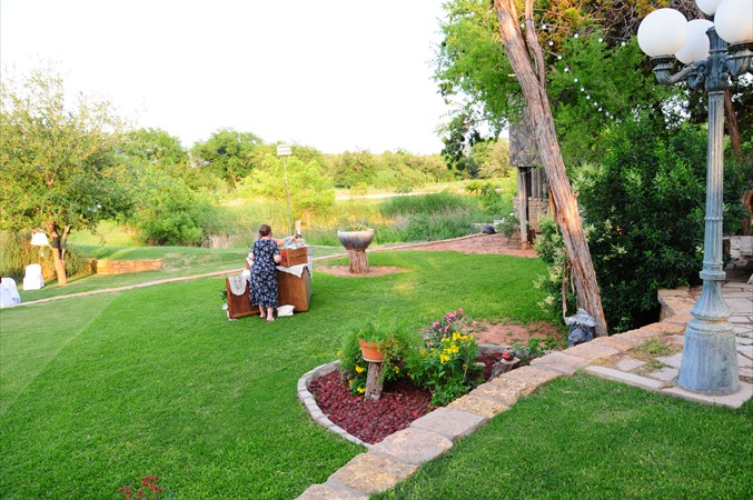"Golden Glow of Setting Sun on Wedding Preparations"