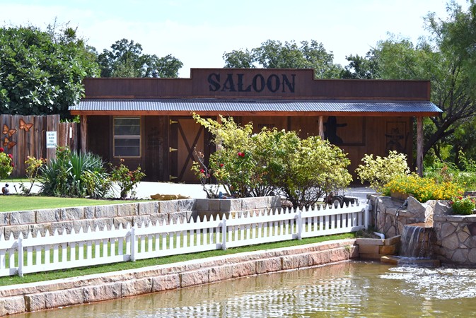 "Saloon Located Across The Driveway Just Passed The Waterfalls"