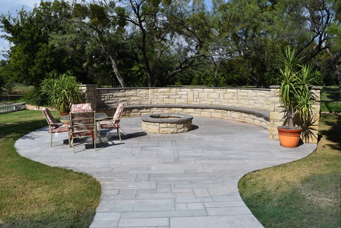 "Wood Fire Pit With Rocked Bench"