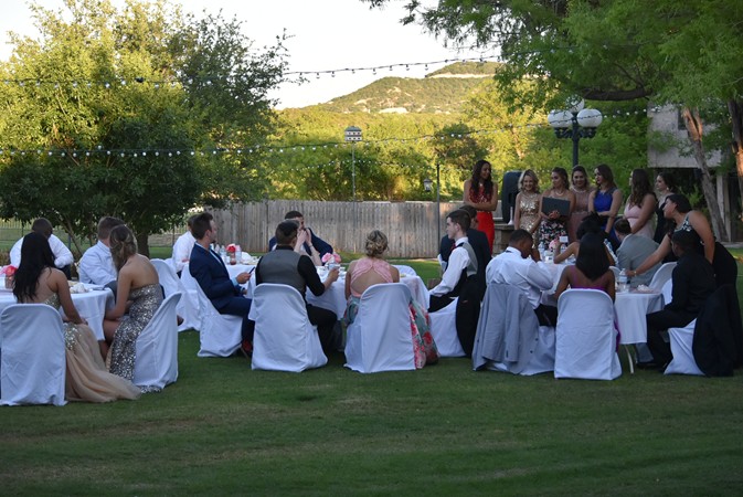 "Snapshot Of Group Enjoying The Entertainment"