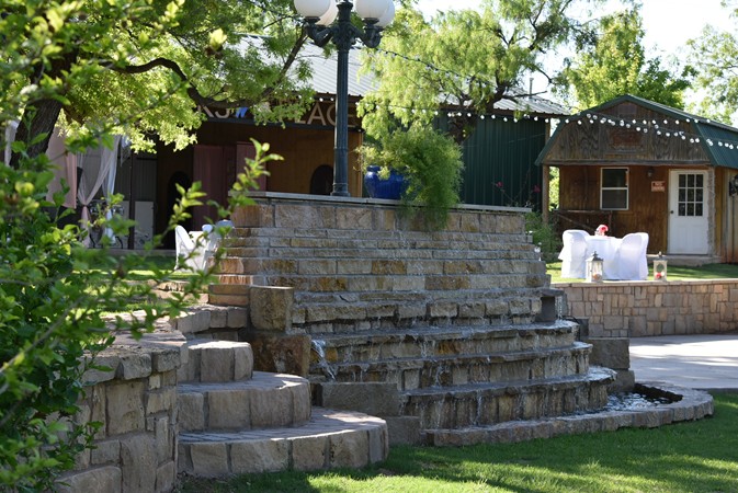 "Double Waterfalls Near Dining Area"