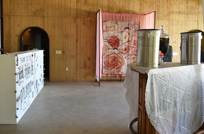 "Covered Serving Buffet And Photo Booth"