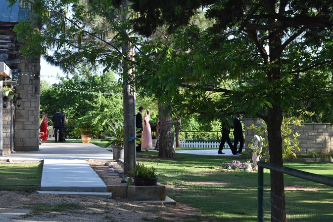 "Sidewalk Also Leads To Tank With Bridge And Waterfalls"