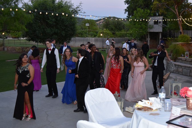 "Dancing Under The Lights As Sun Is Setting"