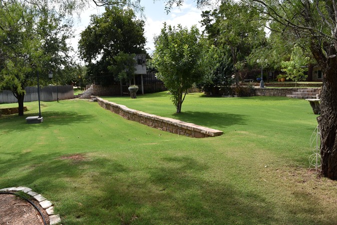 "Midway of View with Light Post on Small Patio"