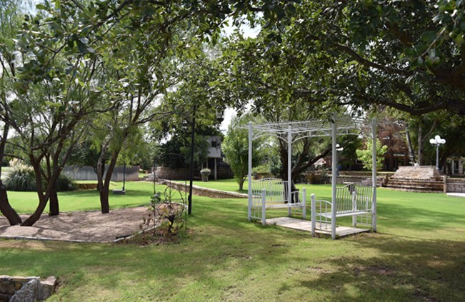 "Wider View from Beyond Double Bench Arbor"