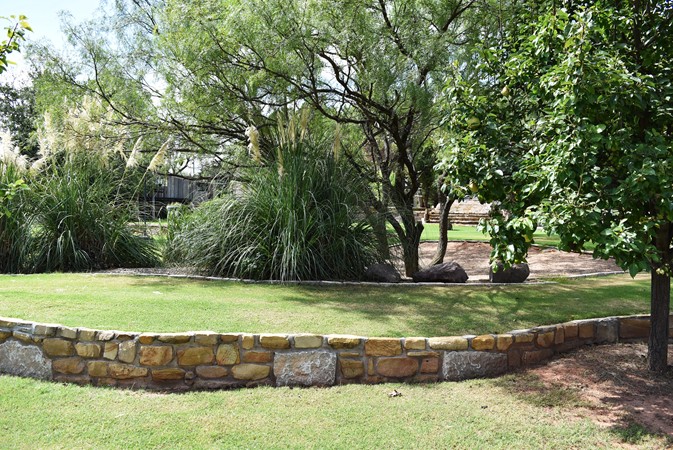 "Walkway Continues On Toward Double Bench Arbor"