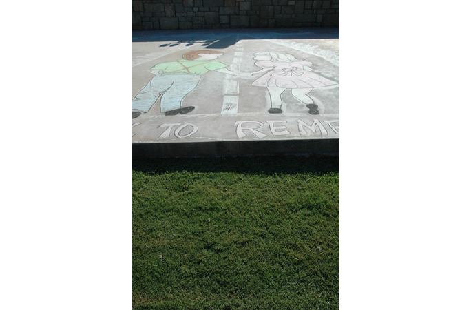 "Our Walk To Remember Chalked on Dance Floor"