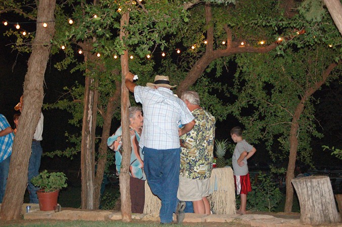 "Guests Visiting Under the Lights "